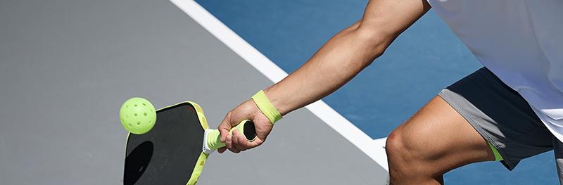 man playing pickleball