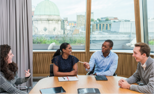 Group of employees discussing ESG